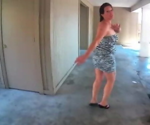 SEXY MILF OUTSIDE PISSING ON..